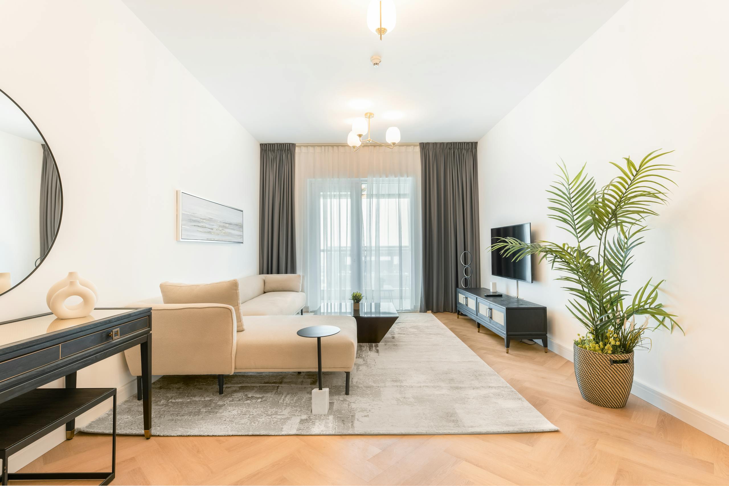 Minimalist living room with cozy sofa and calming neutral tones