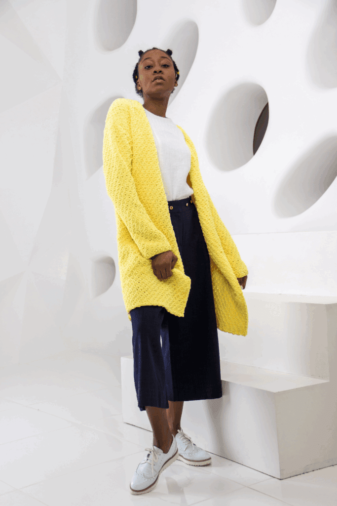 Woman modeling Yellow open front long knit cardigan