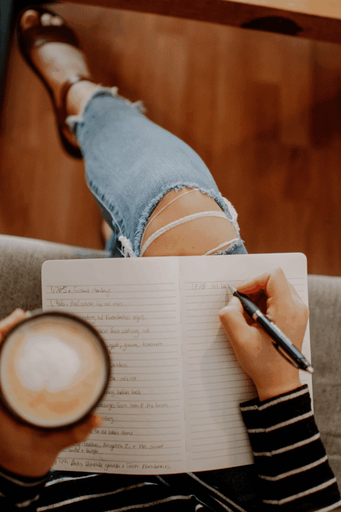 Woman Journaling and having tea. Journaling for beginners