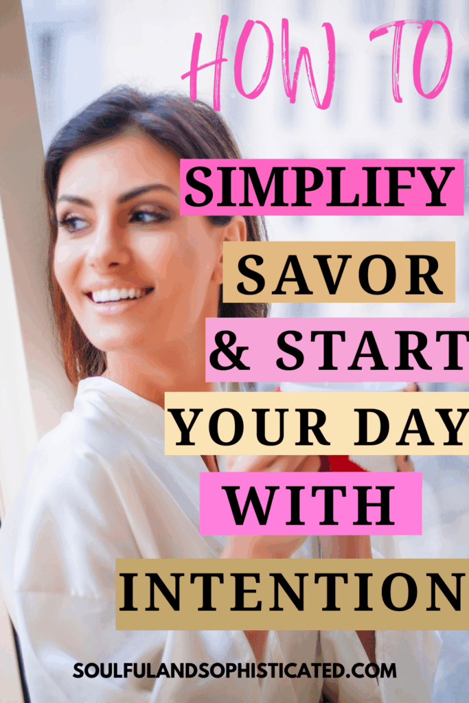 Minimalist Morning Routine for Women Over 35. A woman looking through the window in a bathrobe with coffee in hand. 